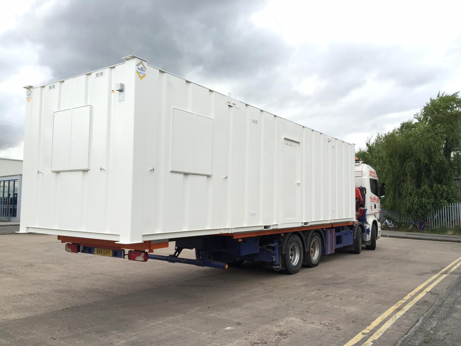 Vehicle delivering specialist transport load